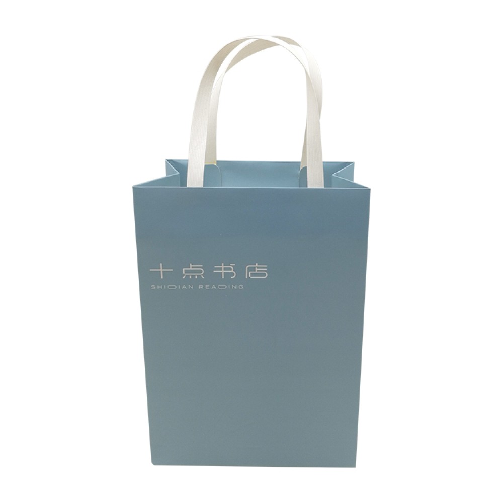 Ivory Paper Material Blue Printing Package Bag With Plastic Handle Ivory Paper Material Blue Printing Package Bag With Plastic Handle