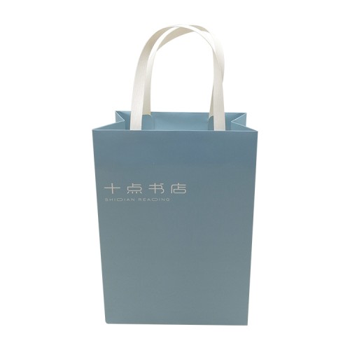 Ivory Paper Material Blue Printing Package Bag With Plastic Handle