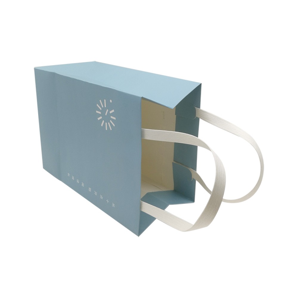 Ivory Paper Material Blue Printing Package Bag With Plastic Handle Ivory Paper Material Blue Printing Package Bag With Plastic Handle